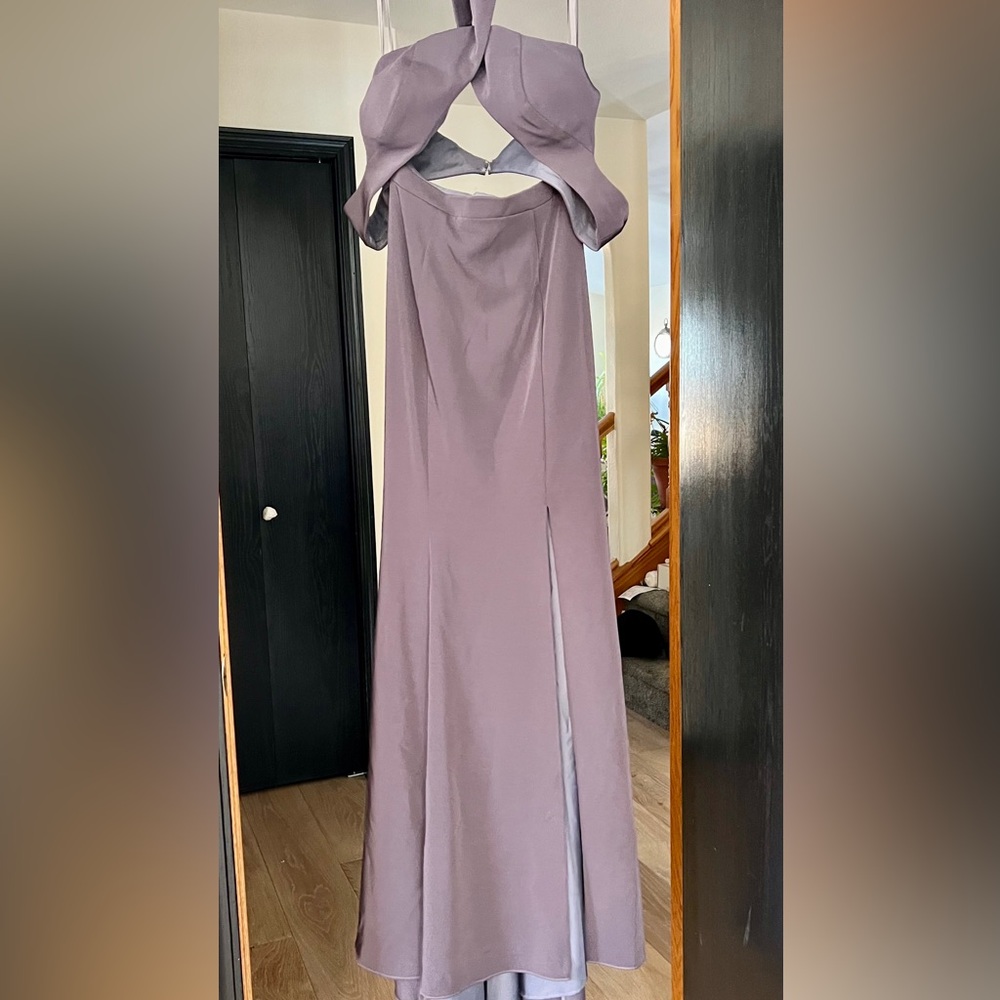 Size 4 plum purple. Two piece prom dress. Never been worn.